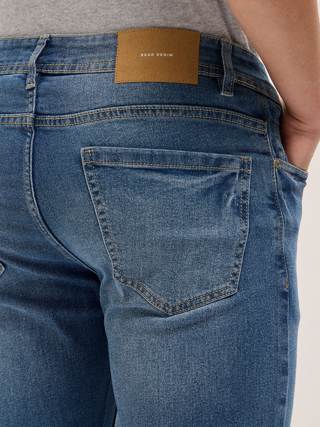 Mid Blue Mid-Rise Slim Fit Jeans with Light Fade