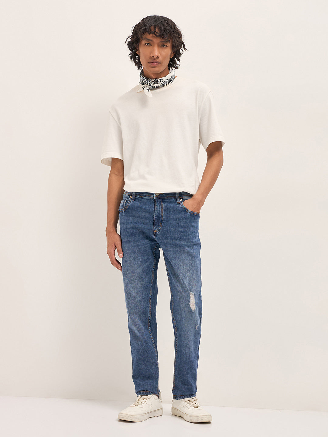 Mid Blue Mid-Rise Slim Fit Jeans with Lightly distressed